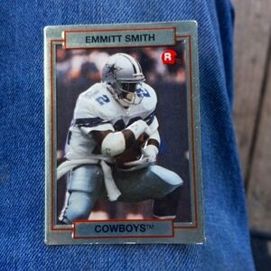 Emmitt Smith football trading card which is a rookie card